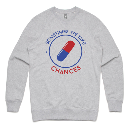 Sweatshirt with red and blue pill logo text reads "Sometimes we take chances"